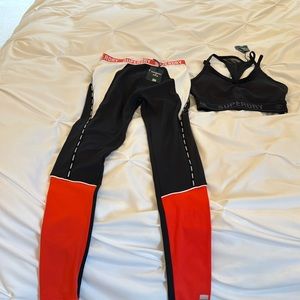 Cute Super dry workout leggings and matching sports bra. Red white and black.